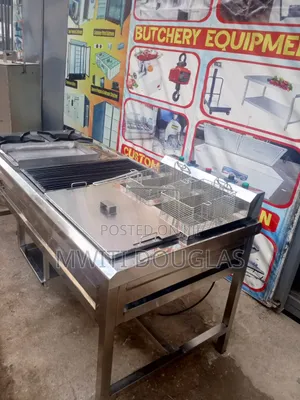 Combined Cooker With a Griddle, Grill, Burners and a Fryer