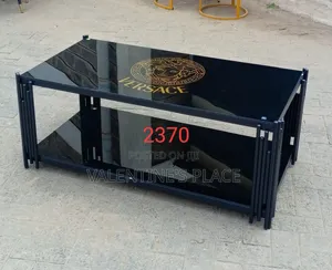 Modern Black Glass Coffee Table Featuring a Striking Versace