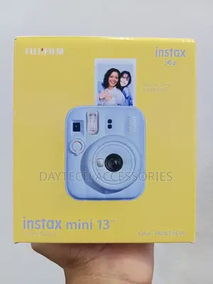 Fujifilm INSTAX Mini 13 Instant Camera in the Frost Blue Color.