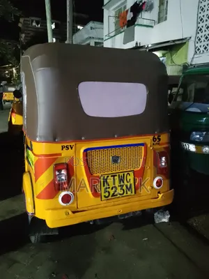 Bajaj RE 2022 Yellow