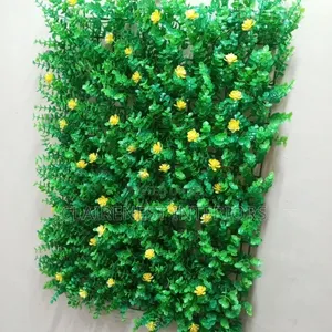 Floor to Ceiling Foliage, Green Boxwood With Yellow Flowers