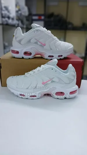 All White Nike Tn Sneakers