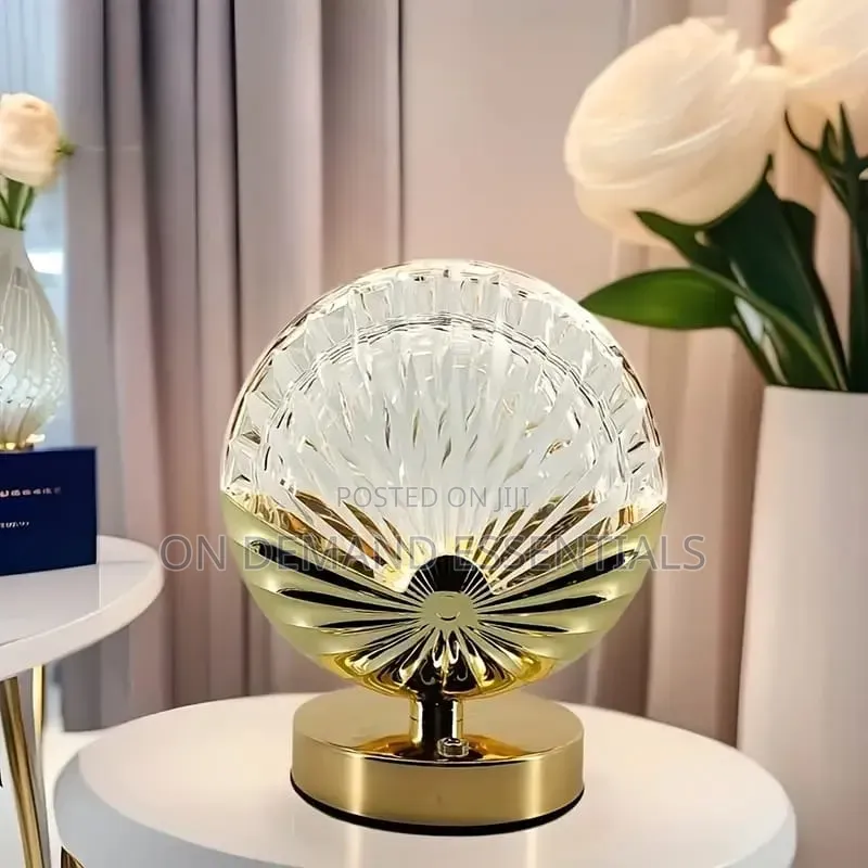 Table Lamp Shell Shaped Design With a Gold Colored Base