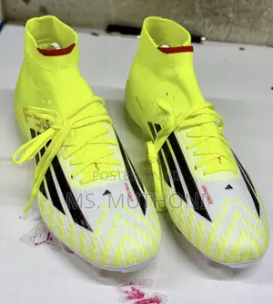 The Adidas F50 League Mid Firm Ground/Multi-Ground Soccer Cleats 40-45