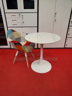 White Tulip Table and Patchwork Eames Chair