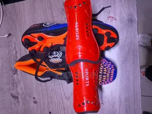 Kids Soccer Boots With Real Madrid Logo. Gift of Free Shin Guards
