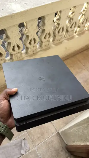 Ps4 Slim in Good Condition With Two Controllers