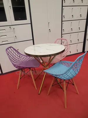 Criss-Cross Base Table and Eames Chairs