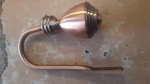 A Stylish Solution for Perfectly Arranged Curtains Bronze Holders